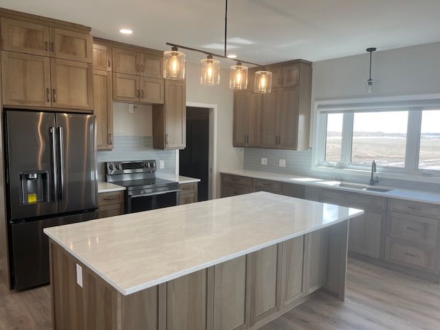 Large kitchen island in finished kitchen